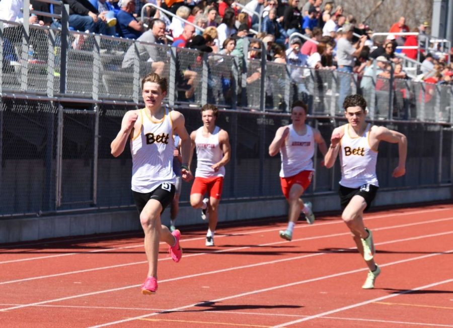 Senior Zach VanWychen competes in the 400 meter sprint at the Jesse Day Relays. VanWychen would go on to win the race. 